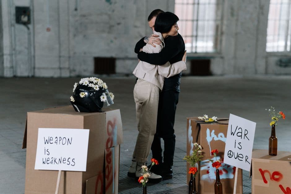 A touching moment during a peaceful protest emphasizes unity and nonviolence.