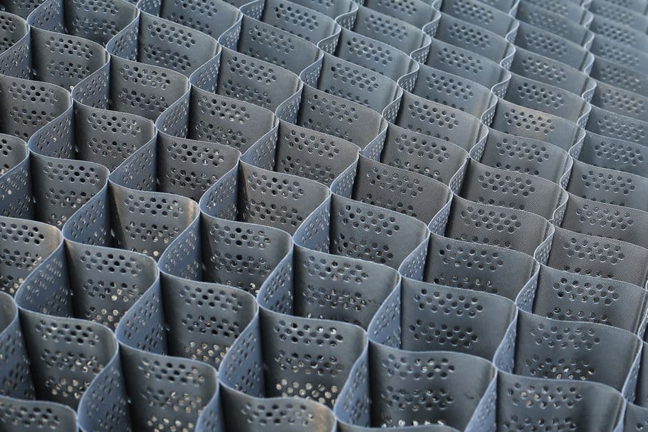 A modern grid pattern with perforated metal for architectural and design applications.