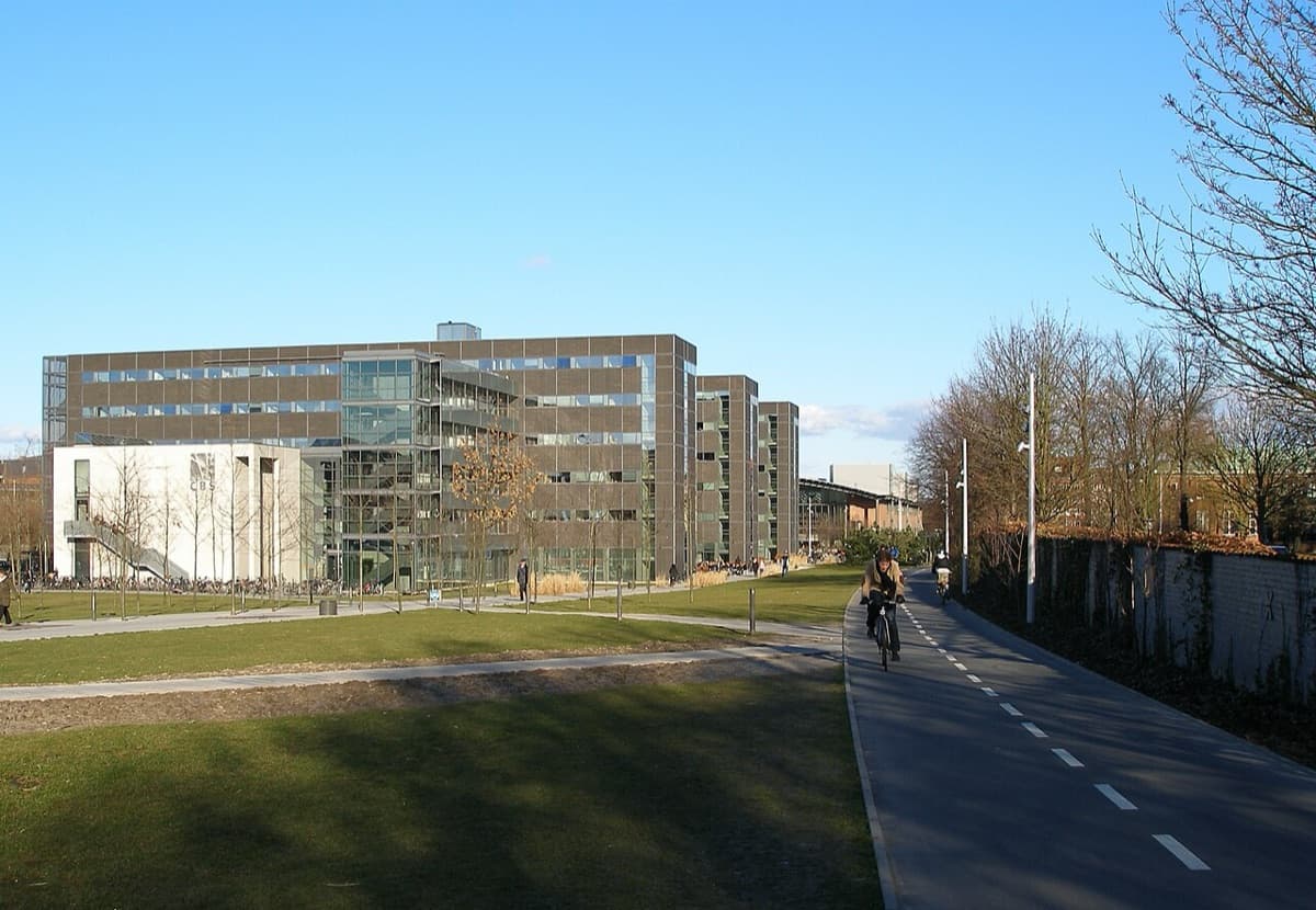 Modern Copenhagen Business School campus with contemporary architecture and green spaces.