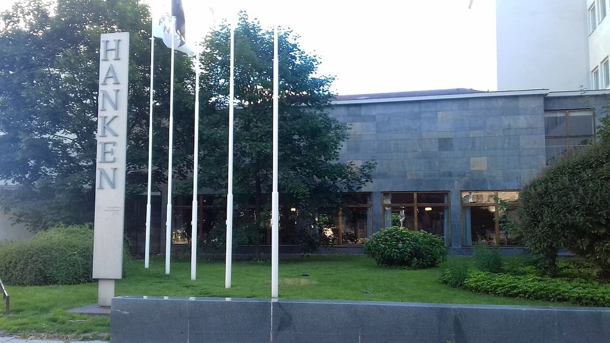 Hanken School of Economics modern building exterior with signage and landscaping.