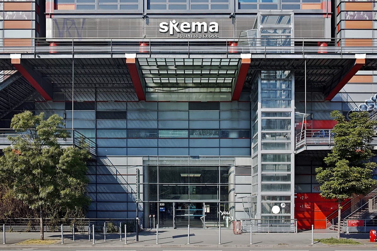 The storefront entrance of SKEMA Business School on Avenue Willy Brandt in Lille, showing modern institutional architecture.