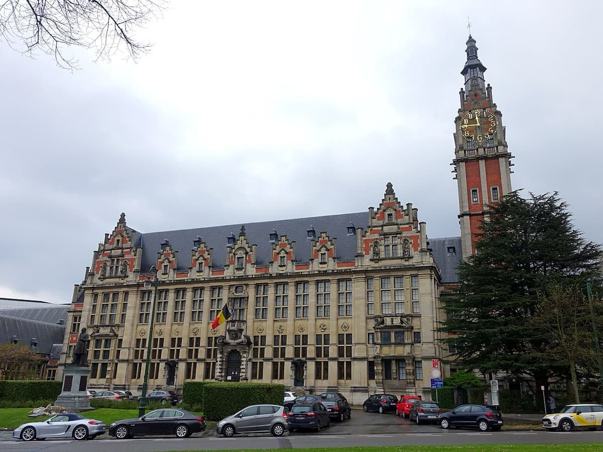 Historic institutional building of Université libre de Bruxelles featuring ornate facade with distinctive clock tower and Flemish-inspired architectural elements.